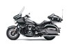 Side angle of a motorcycle staged in a white studio background.