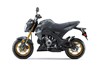 Side angle of a motorcycle staged in a white studio background.