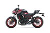 Side angle of a motorcycle staged in a white studio background.