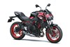 Three-quarter front angle of a motorcycle staged in a white studio background.