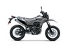 Profile angle of a motorcycle staged in a white studio background.