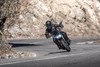 Front angle of a motorcycle in the mountains.